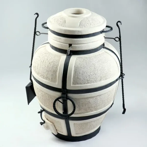 Тандыр — это восточная керамическая печь, предназначенная для приготовления рыбы, мяса и овощей. Изделие состоит из шамо