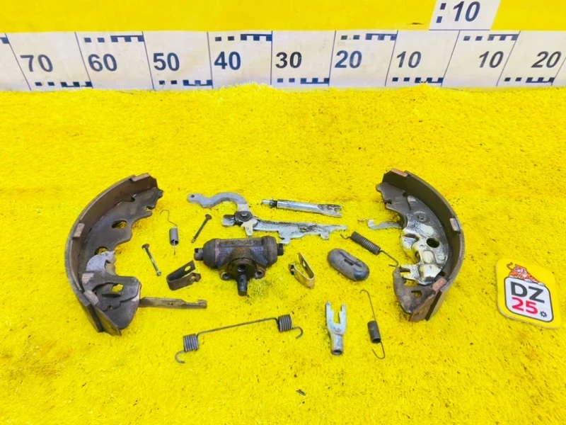 Фото для Механизм стояночного тормоза MAZDA BONGO SKP2M L8 2011/Цвет 22V задн. лев. (б/у)