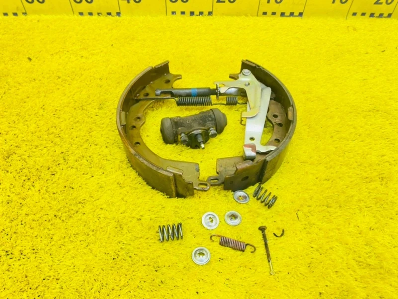 Фото для Механизм стояночного тормоза TOYOTA TOWN ACE NOAH SR50G 3SFE 1998/Цвет 1C1 задн. лев. (б/у)